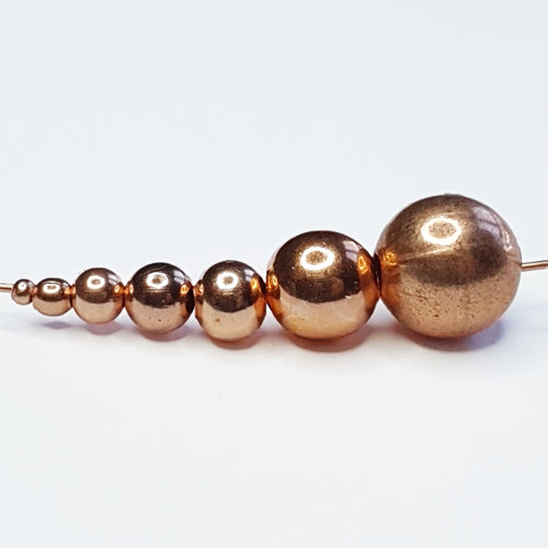 Smooth copper beads