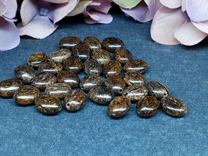 Bronzite - drilled focal bead - oval - 11 mm