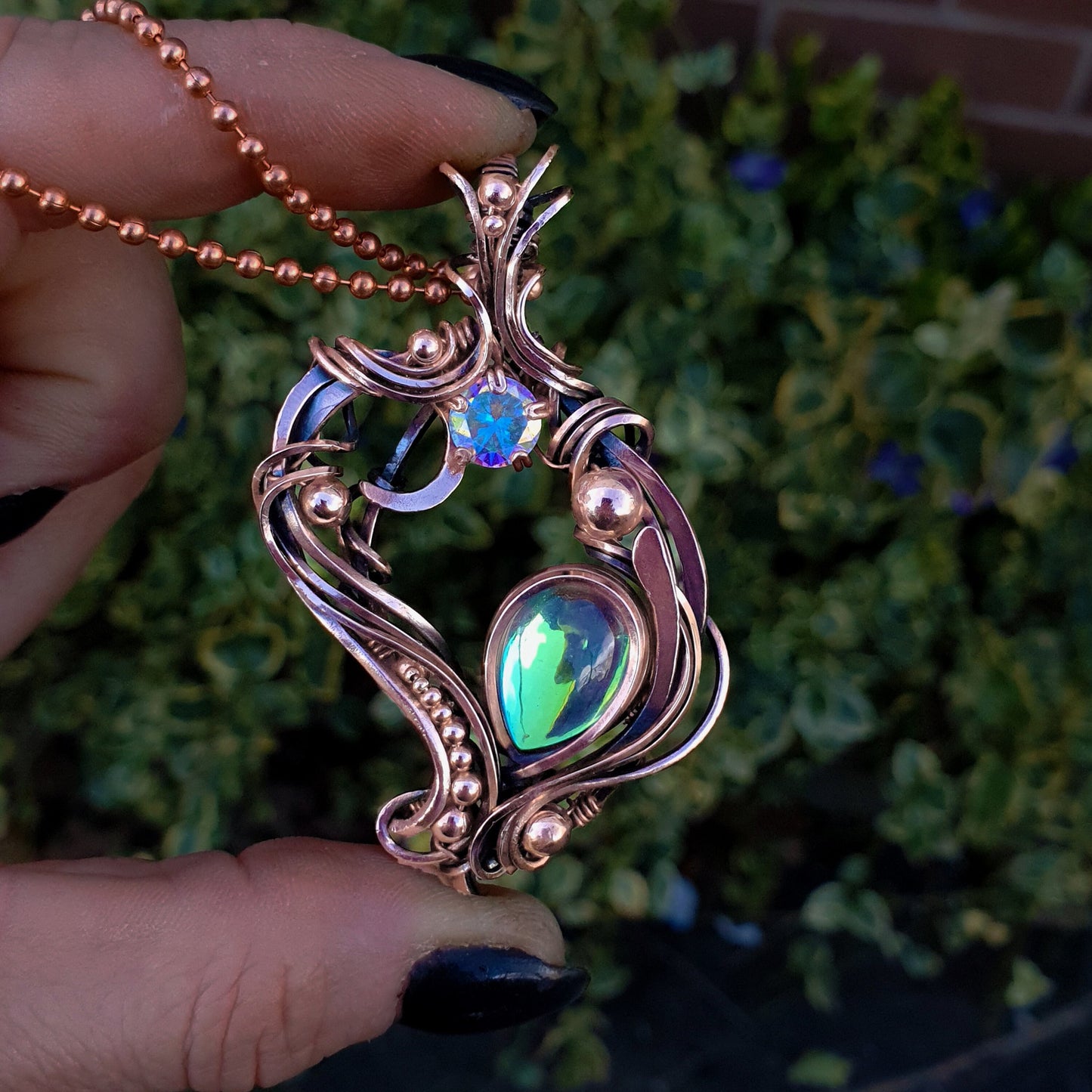 Copper pendant with aura quartz focal