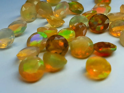 Ethiopian opal - loose gemstone - various sizes - round faceted cut