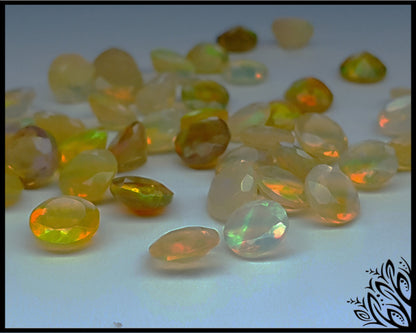 Ethiopian opal - loose gemstone - various sizes - round faceted cut