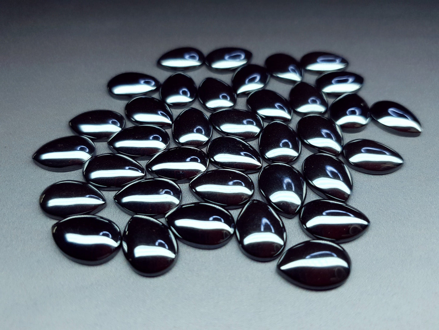 Silver hematite cabochon - pear - 14 mm