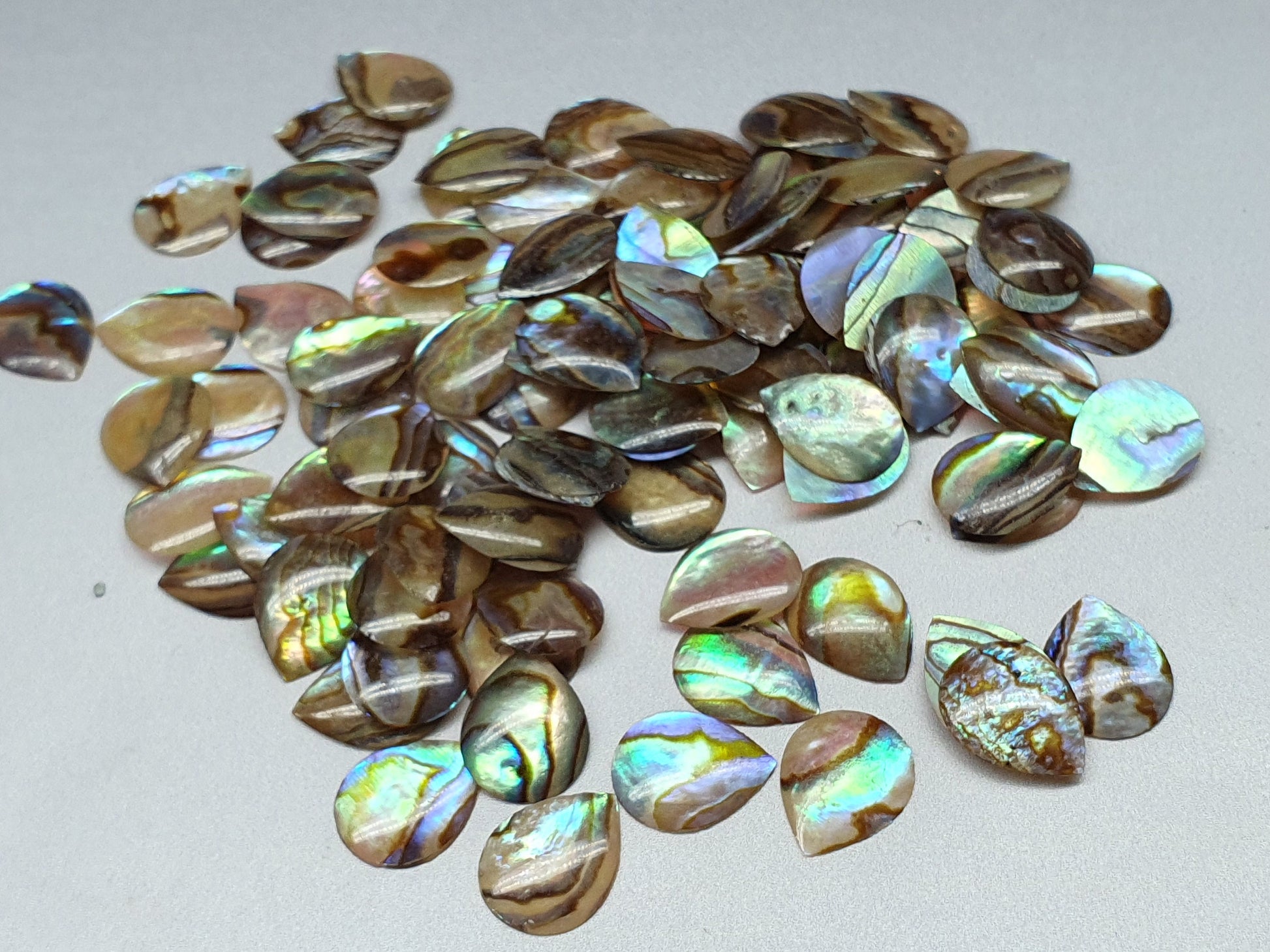 Thin paua shell pear cabochon 10 mm