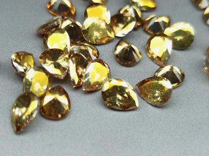 Cubic zirconia - Mystic gold - 8 mm - pear facet cut