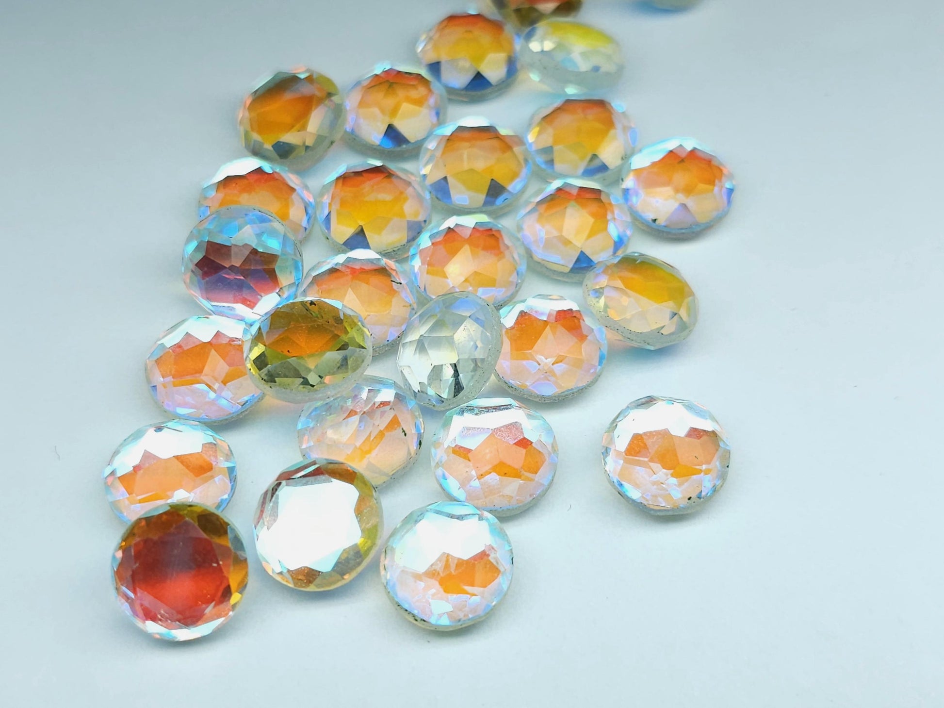 Glass crystal - aura quartz - 12 mm - faceted round