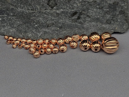 Unplated pumpkin beads - bare copper