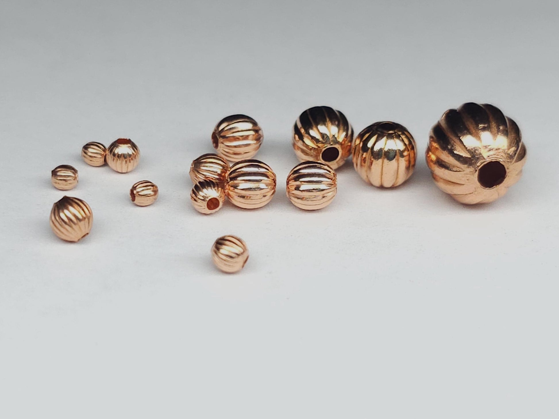 Unplated pumpkin beads - bare copper