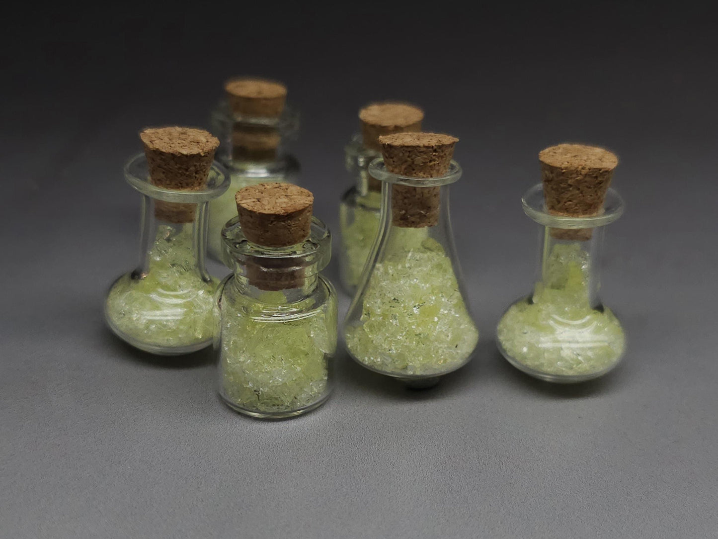 Uranium glass vial - cylindrical corked potion bottle