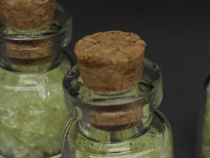 Uranium glass vial - cylindrical corked potion bottle