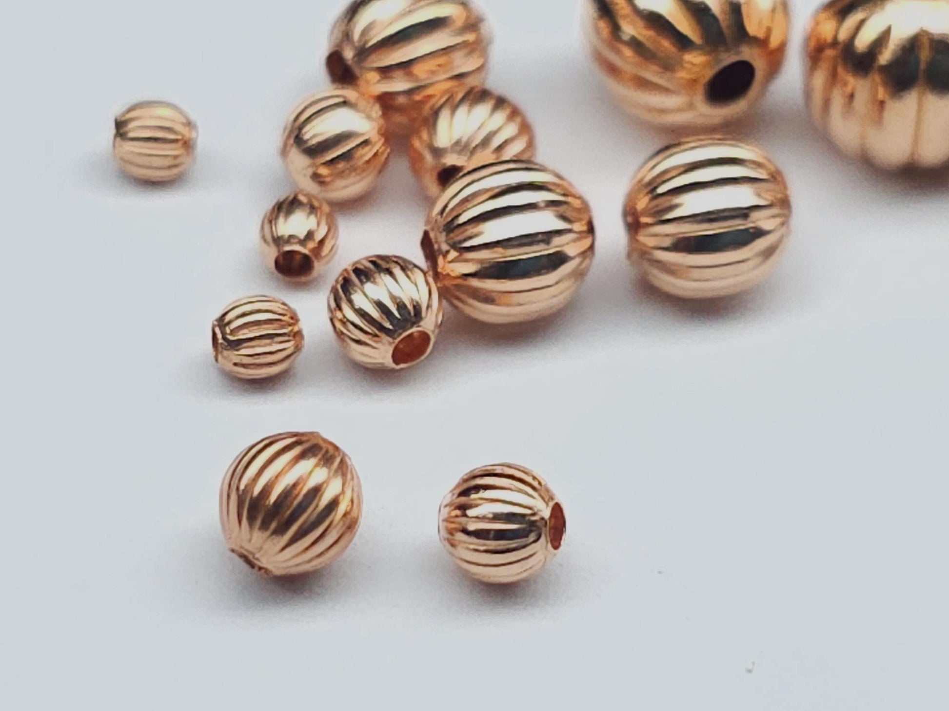 Unplated pumpkin beads - bare copper