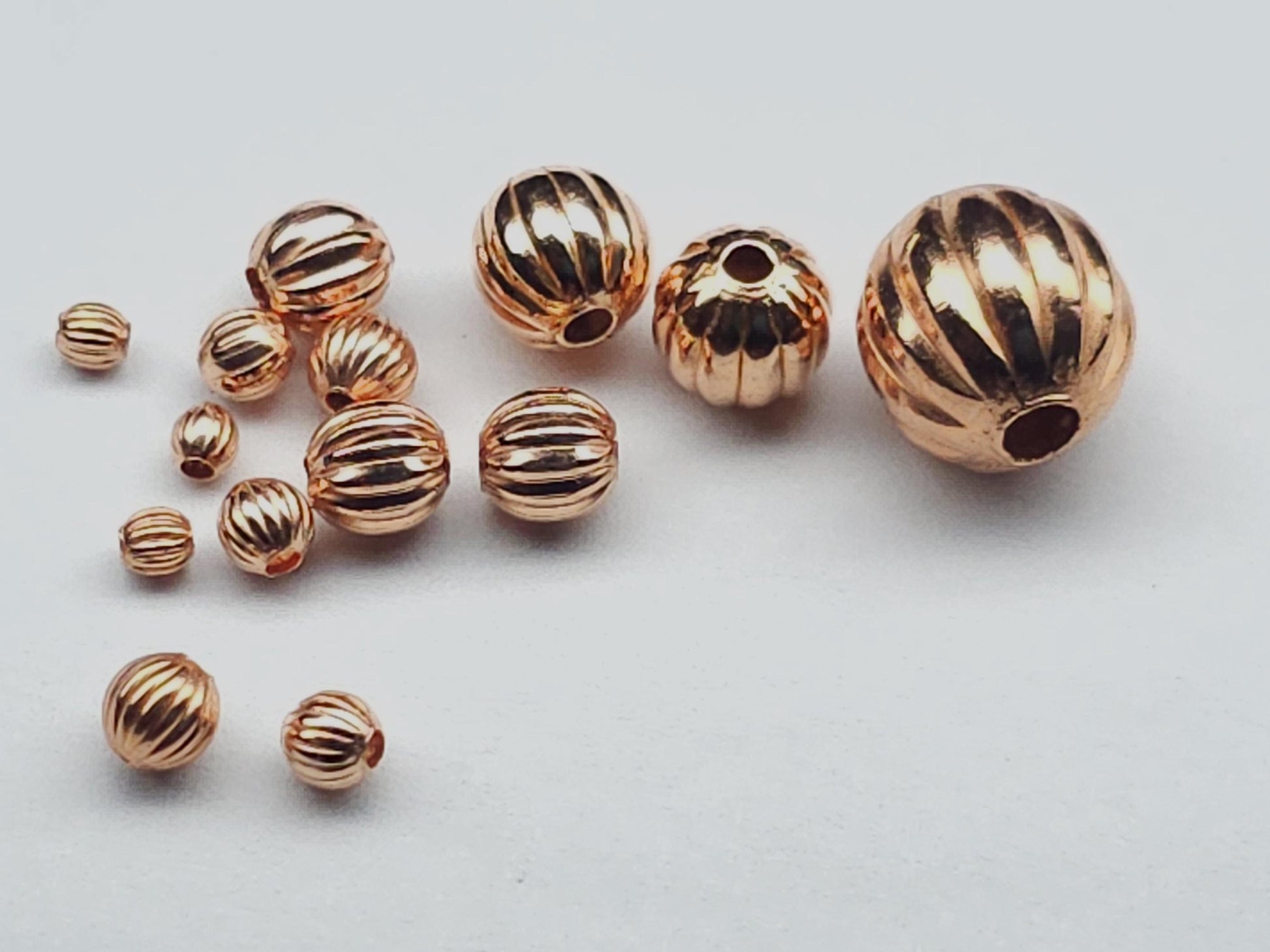 Unplated pumpkin beads - bare copper