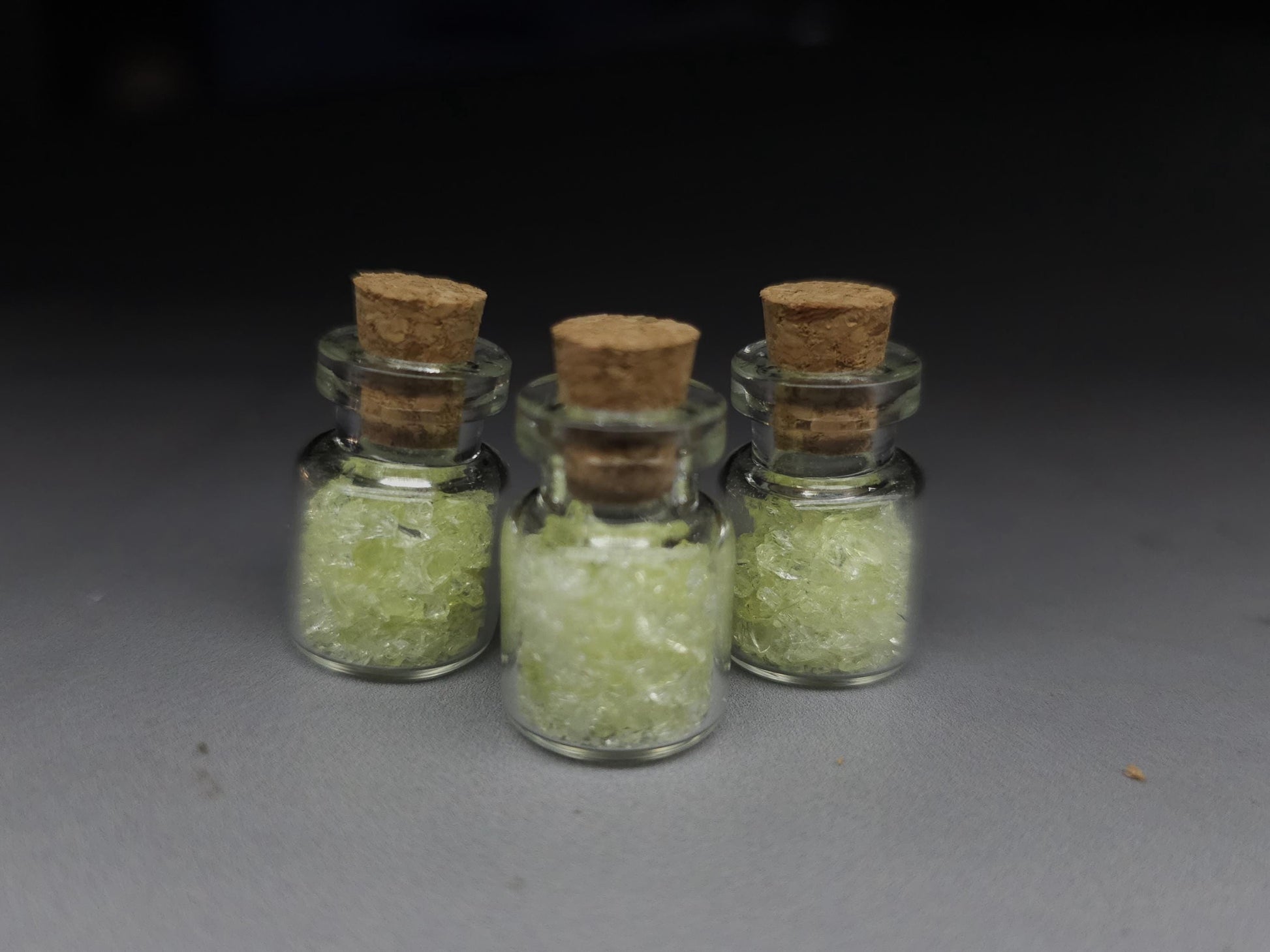 Uranium glass vial - cylindrical corked potion bottle