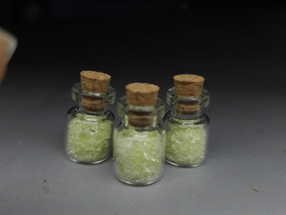 Uranium glass vial - cylindrical corked potion bottle