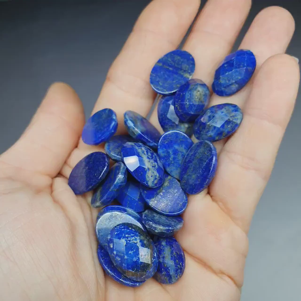 Faceted lapis lazuli cabochon - oval - 18 mm